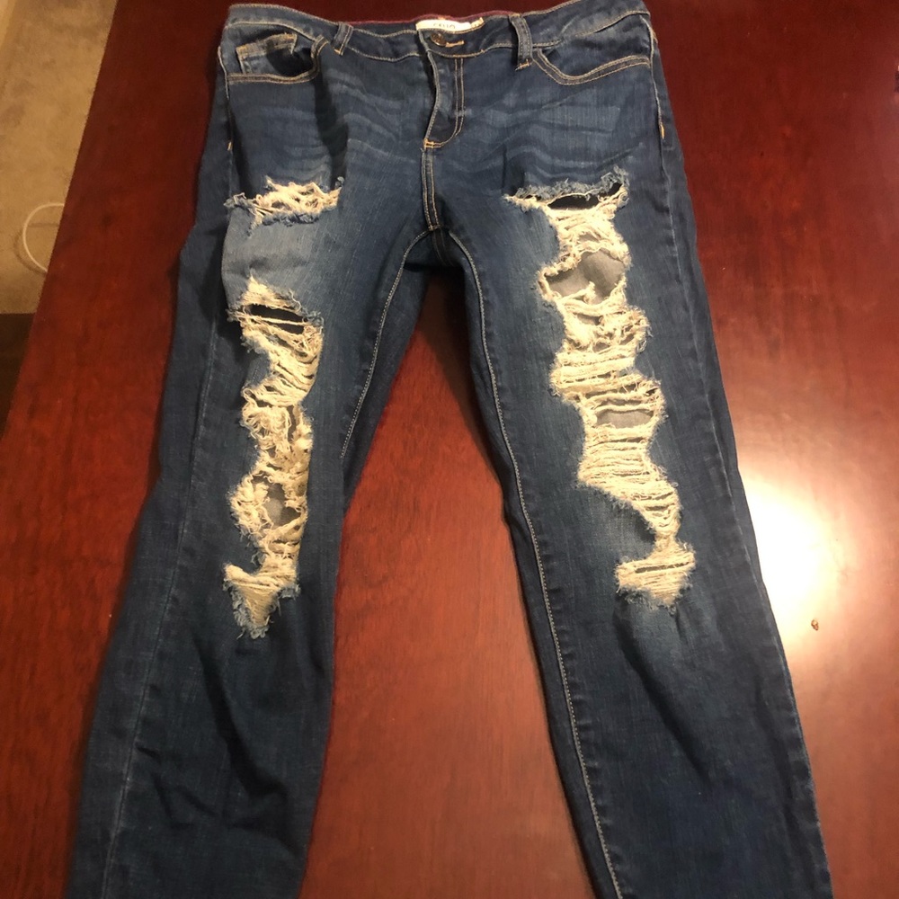 Distressed denim jeans